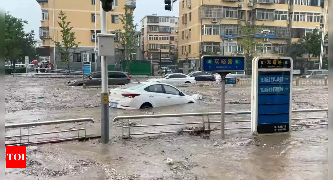 Storm Doksuri: Beijing on alert with two killed as heavy rain batters north China