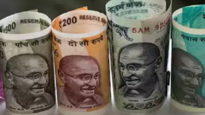 Rupee gains six paise against dollar to close at 84.44